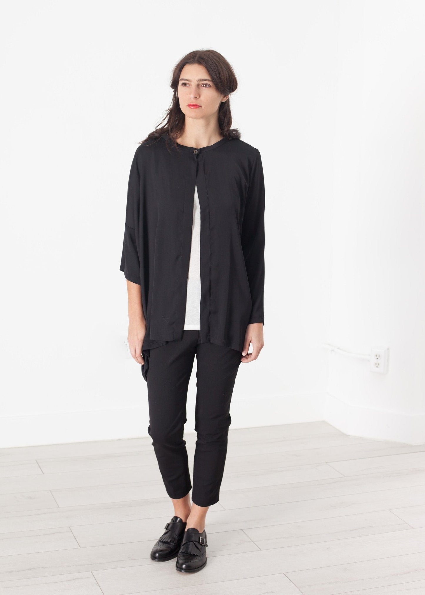 Cardigan sbilanciato in nero